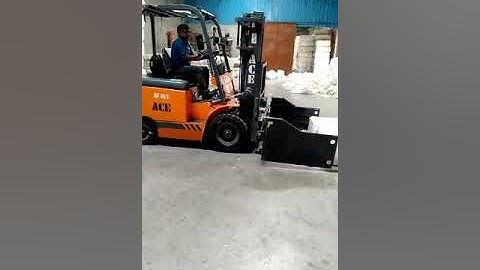 ACE Electric forklift with bale clamp attachment.