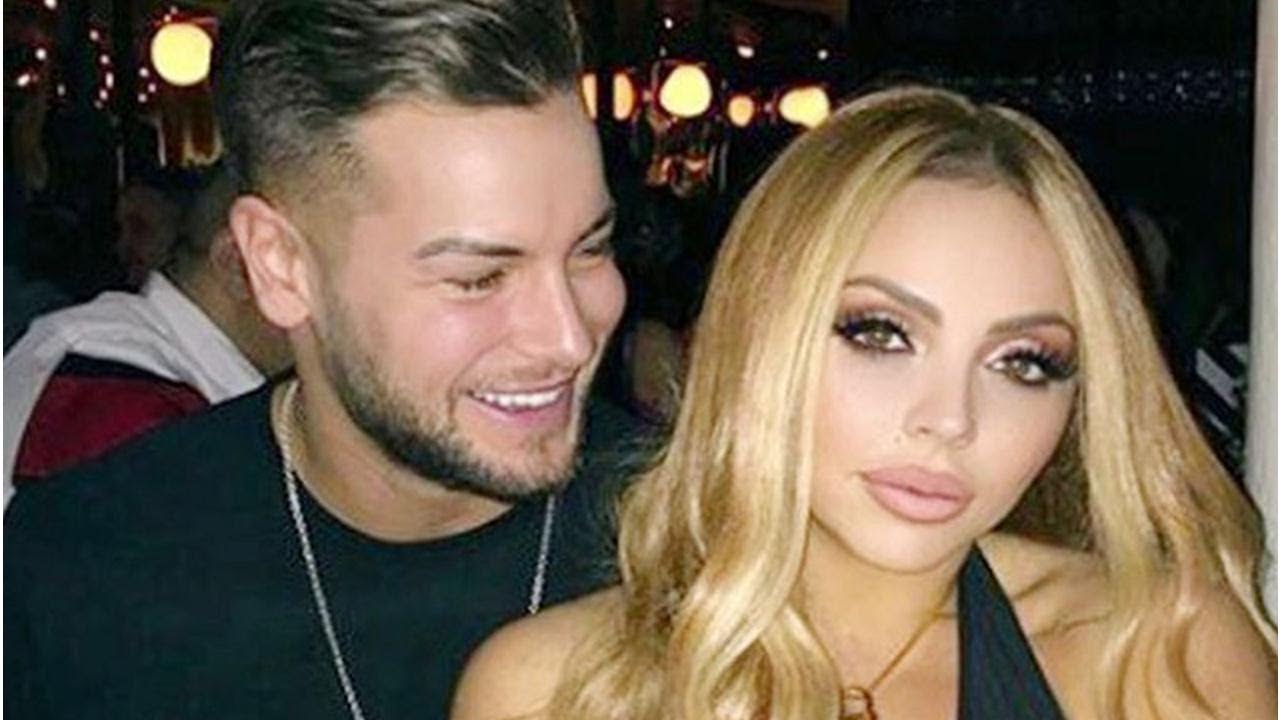 Chris Hughes gazes adoringly at Jesy Nelson as she ignores him on date night