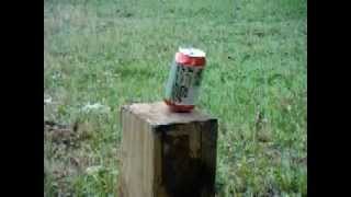 Slow motion coke can explosion shoot by ruger air rifle .22