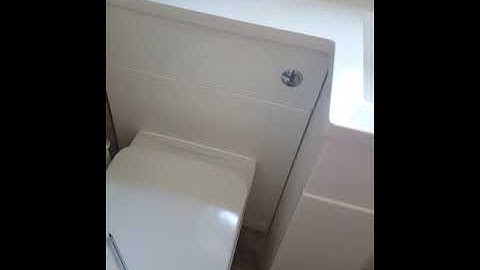 Accessing the water cistern on a Cook & Lewis Ardesio vanity & toilet unit