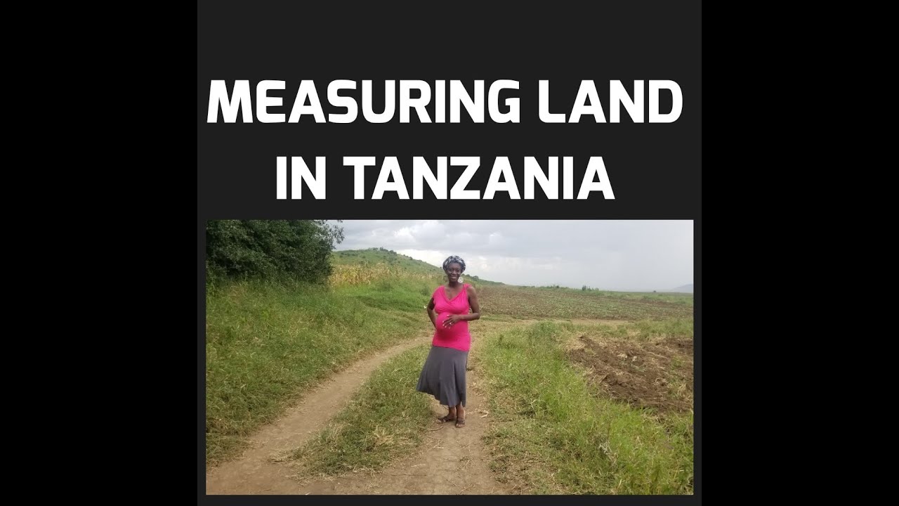 MEASURING OUR LAND IN TANZANIA THE JAMAITIANS HAVE THE LAND MEASURED
