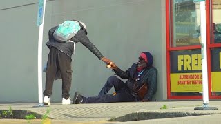 Dropping $1000 In Front of Homeless Guy \& Following Him To See What He Does With It!