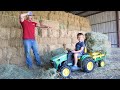 Using tractors to pick up a huge hay mess on the farm | Tractors for kids