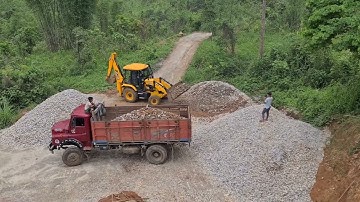 jcb loading gravel stone into a truck || jcb working in a stone crusher factory || jcb bs4 working