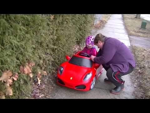 Granddaughters with play cars