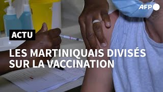 En proie au variant Delta, les Martiniquais divisés sur la vaccination | AFP
