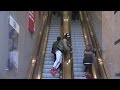 Touching Strangers Hands on Escalator in New York City