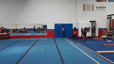 Round-off back hand spring layout half on floor