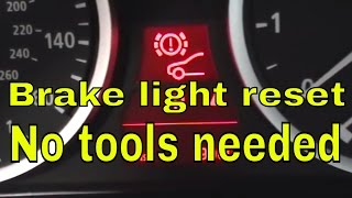 how to reset brake pad light on BMW