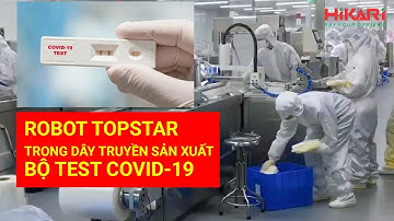 Robot Topstar làm việc trong dây truyền sản xuất bộ kít test covid 19