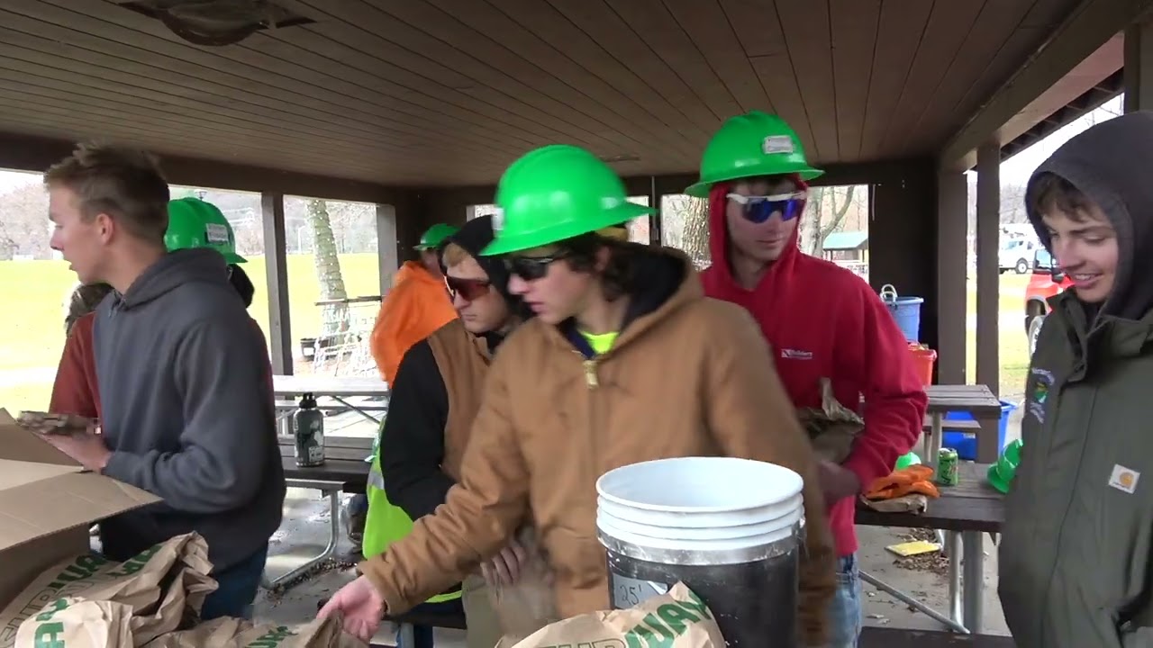 Rotary Lights Set-up. WINDY OCT. 31. City Utilities & SW Wisconsin Technical College.