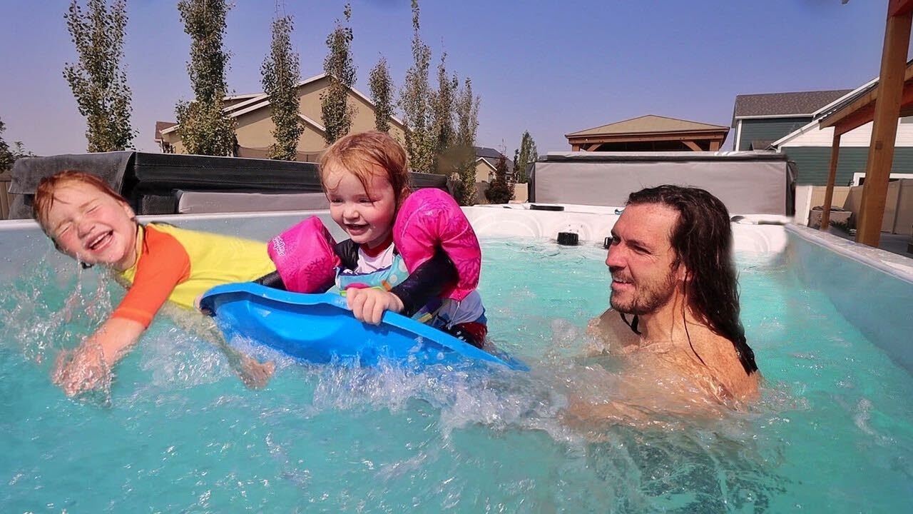 SURF inside our POOL ������♀️ Hot Tub surfing in our backyard spa! Adley & Mom build new doll house
