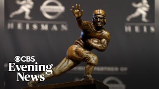 Reporters Notebook The Story Behind The Heisman Trophy