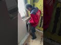 the process of installing ceramic tiles on the wall under the window of a building room #popular