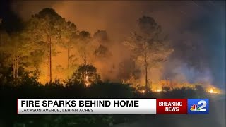 Fire sparks behind home in Lehigh Acres