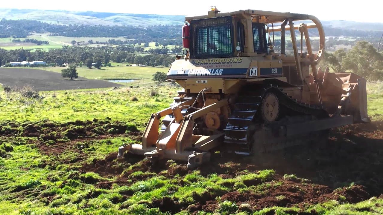 Dozer ripping in two directions - YouTube