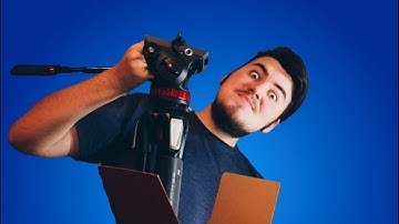 Me Unboxing the Manfrotto MT055XPRO3 Video Tripod