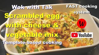 Wok with Tak.  Scrambled egg with cheese & vegetable mix.  Template-based cooking.