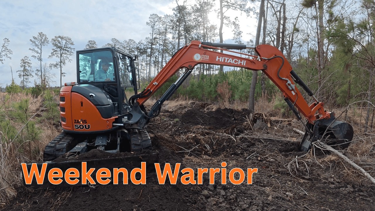 Hitachi 50 clearing and cleaning ditches