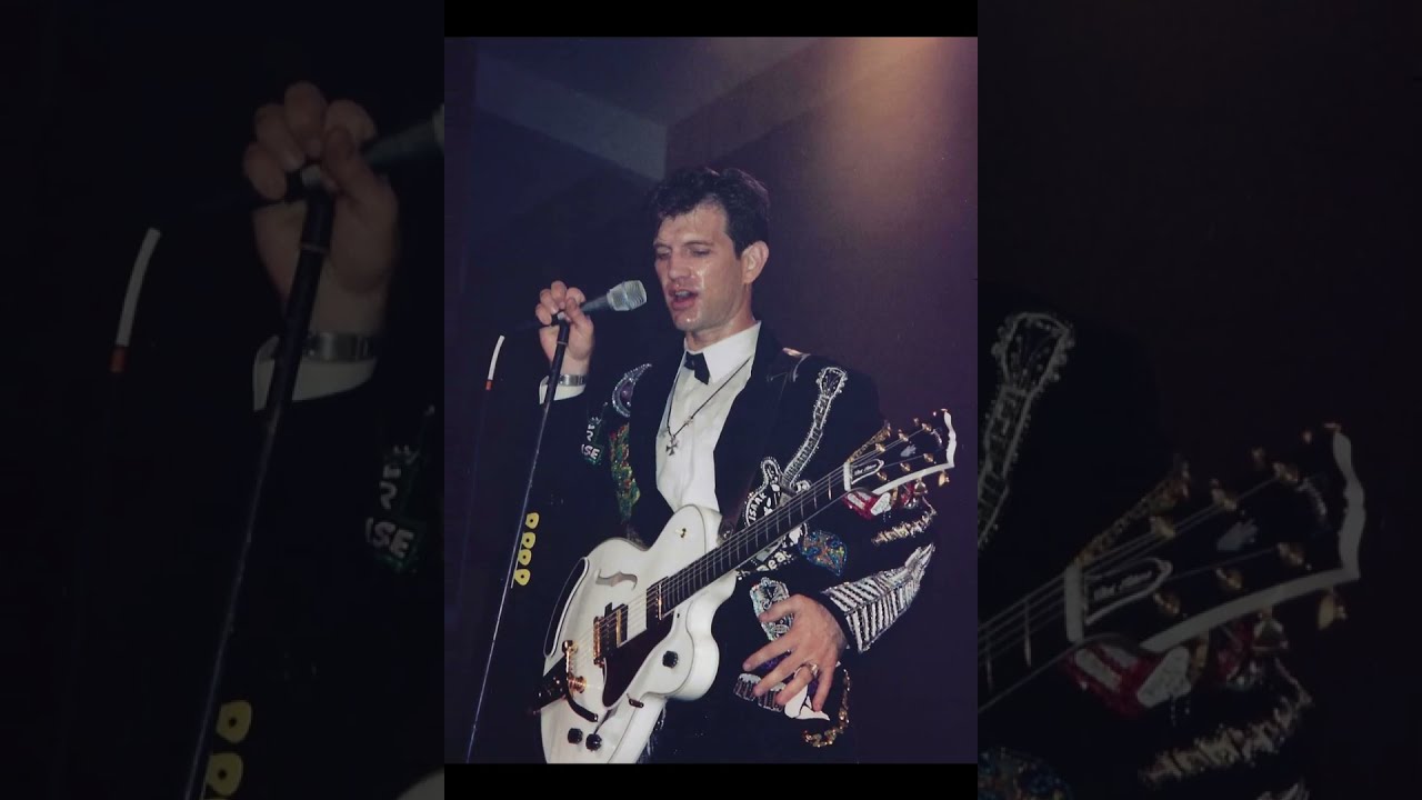 Chris Isaak and Silvertone performing "Shake Your Hips" with Junior Brown (audio from 1993).