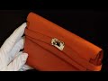 Hermes kelly long wallet classic orange refurbished and for sale by resurrecshion resell