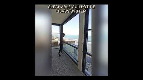 CLEANABLE GUILLOTINE GLASS SYSTEM