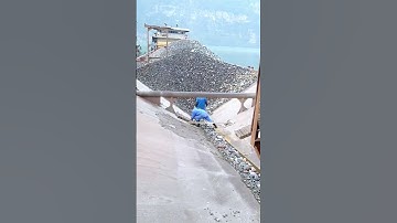 Barge unloading large cobblestone- Relaxing video