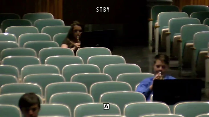 High school band, conducted by Raymond Bartlett.