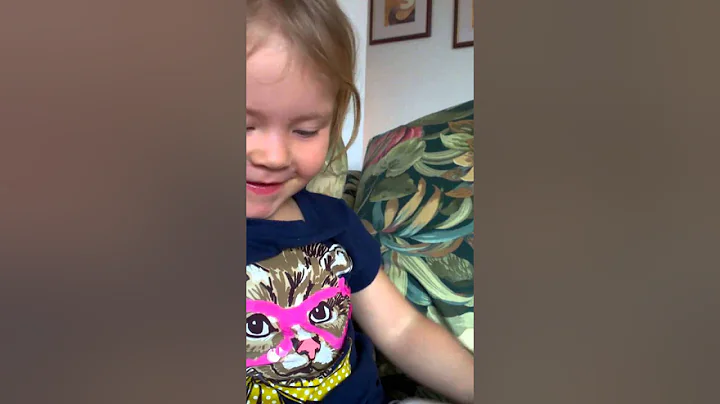 Lily reading about Charlie the dog