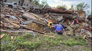 Rescue Workers Pull Woman From Rubble After Tornado Rips Through Greenfield