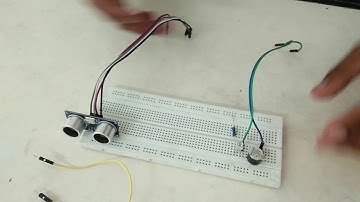 Sistem Parkir Otomatis dengan Menggunakan Sensor Ultrasonik