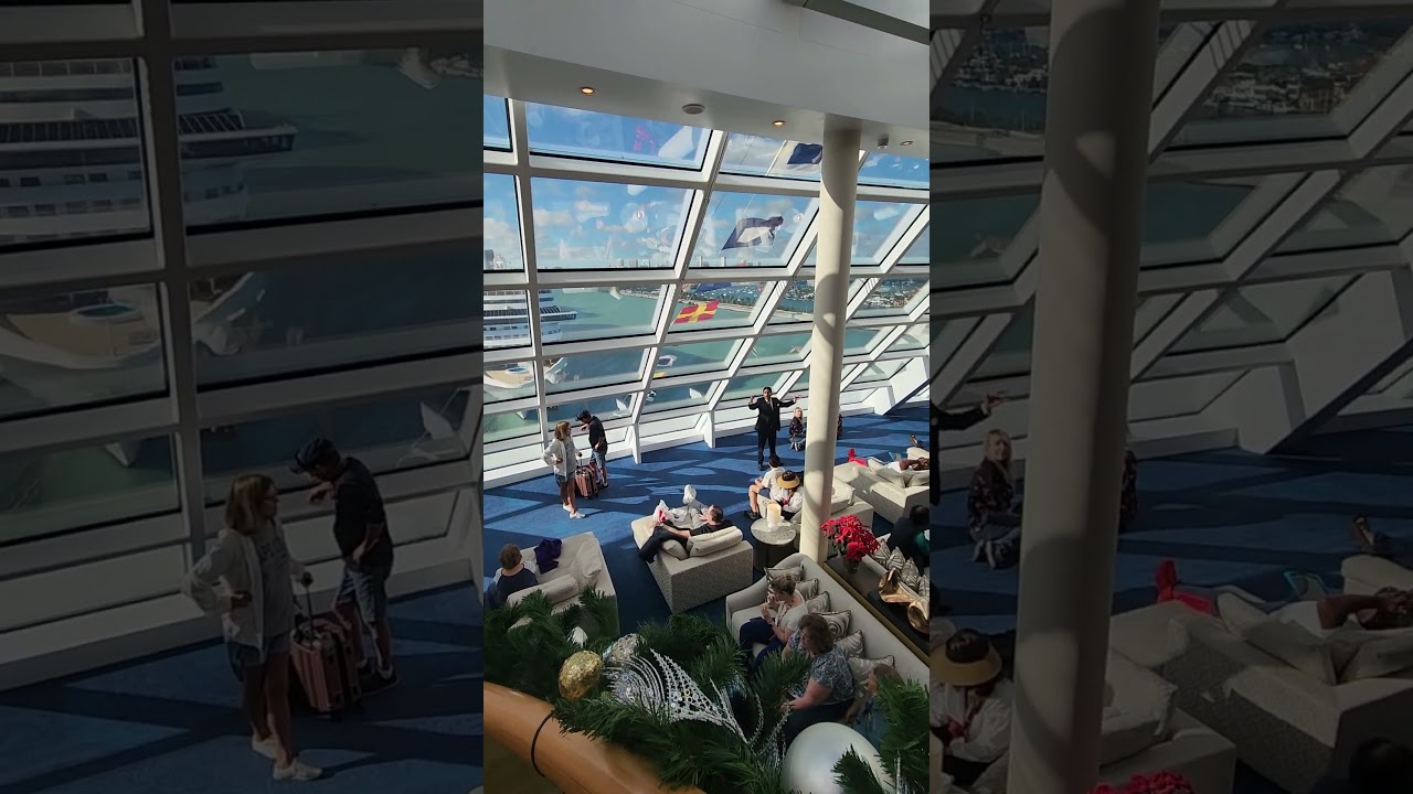 Concierge Welcoming Guests to the Exclusive Haven Area on the Norwegian Encore