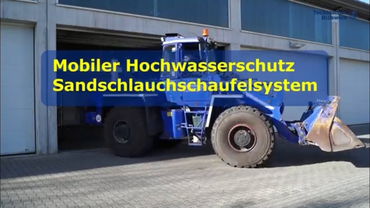 Mobiler Hochwasserschutz des THW München- Ost (Sandschlauch-Schaufelsystem)