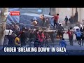 Palestinians mob aid truck as order breaks down in Gaza | Israel-Hamas war