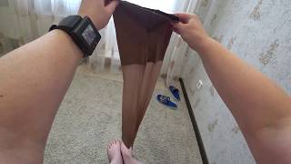 ASМR. The lady dresses new nylon pantyhose. POV