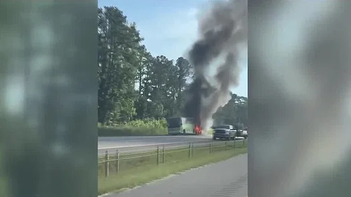 Lanes reopen after charter bus catches fire on I-20
