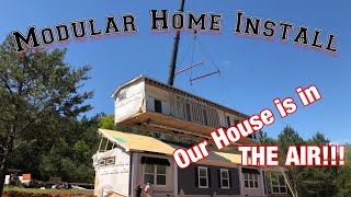 Crane lifting Modular Home drone footage