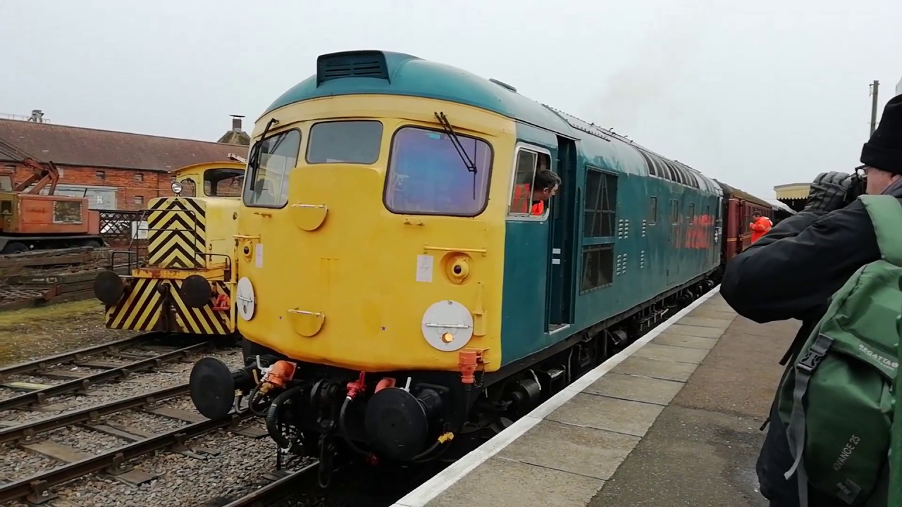 Class 26 D5343 crossing Dereham level crossing on the mid norfolk railway