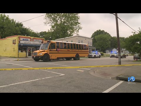 Woman jumped on hood of school bus after being shot: NNPD