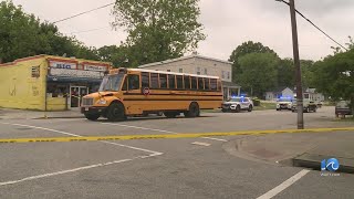 Woman jumped on hood of school bus after being shot: NNPD