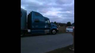 Toyota Tundra pulls stuck semi out of ditch.