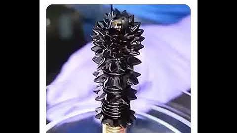 Pouring ferrofluid onto a screw