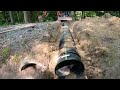 Installing a larger culvert to replace a clogged one