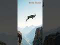 Gravity-Defying Mountain Goat: Leaping Between Cliffs Like a Dancer!