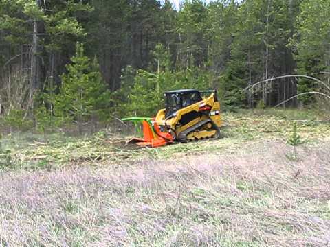 Skid steer land clearing attachments