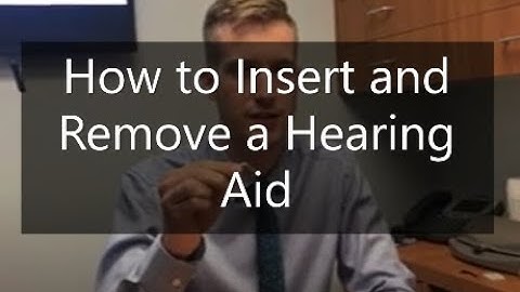 How to insert and remove a hearing aid