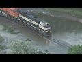 Watch train negotiate flooded track in NE Colorado