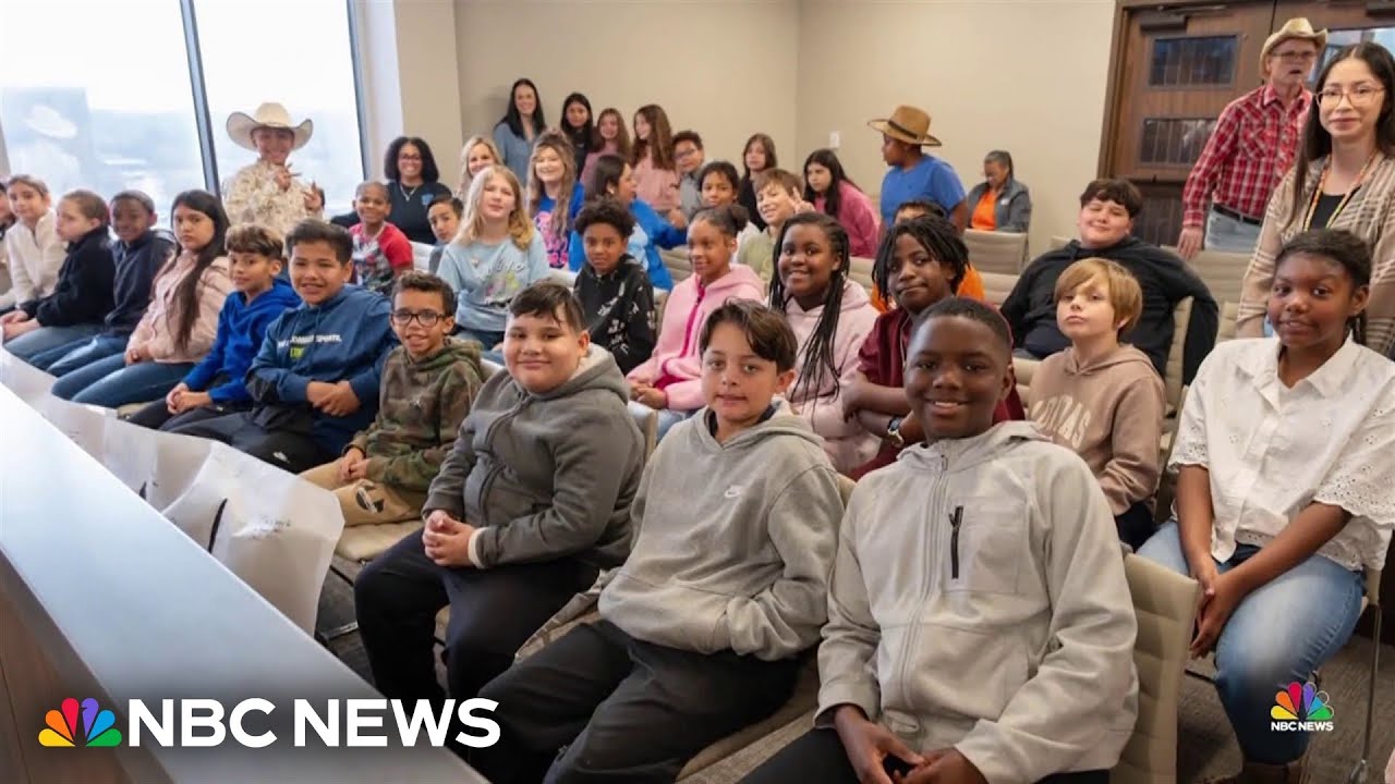 Classmates surprise friend at adoption ceremony
