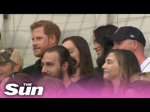 Awkward moment Prince Harry ‘ignores’ Meghan Markle as she tries to talk to him at baseball game