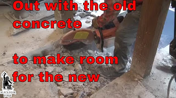 Tearing out the old concrete to make room for the new power hammer foundation